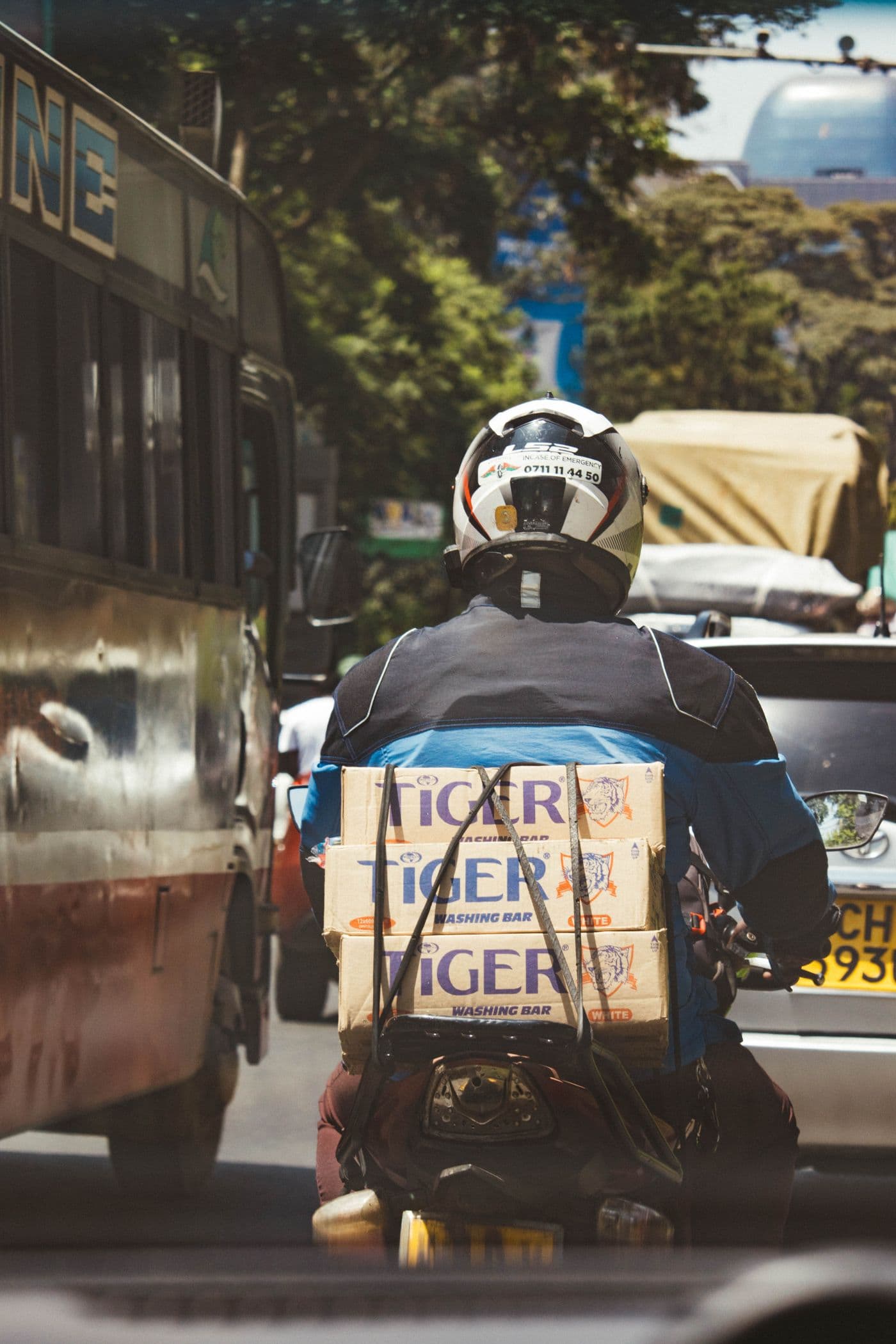 A Rydsom courier delivering a parcel